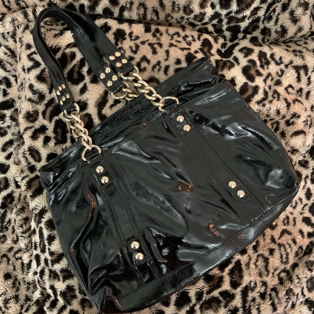 Large black patent leather handbag tote